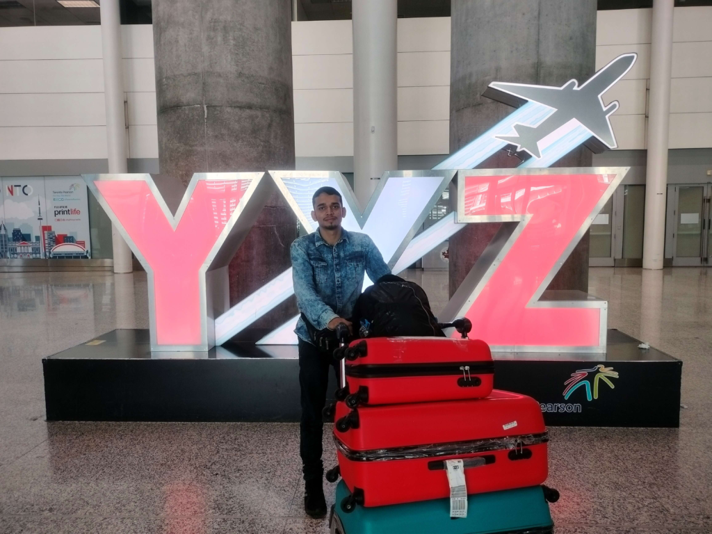 Me Standing at the YYZ Sign - Toronto Pearson International Airport